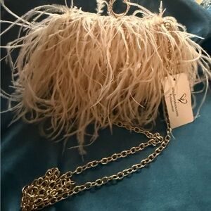 Elegant Cream Feathered Clutch